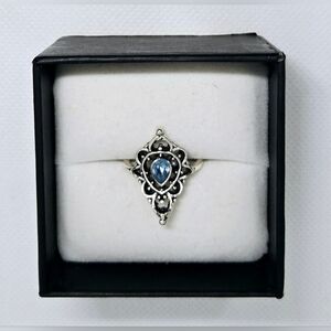 Elegant Silver Tone Ring with Blue Gemstone
